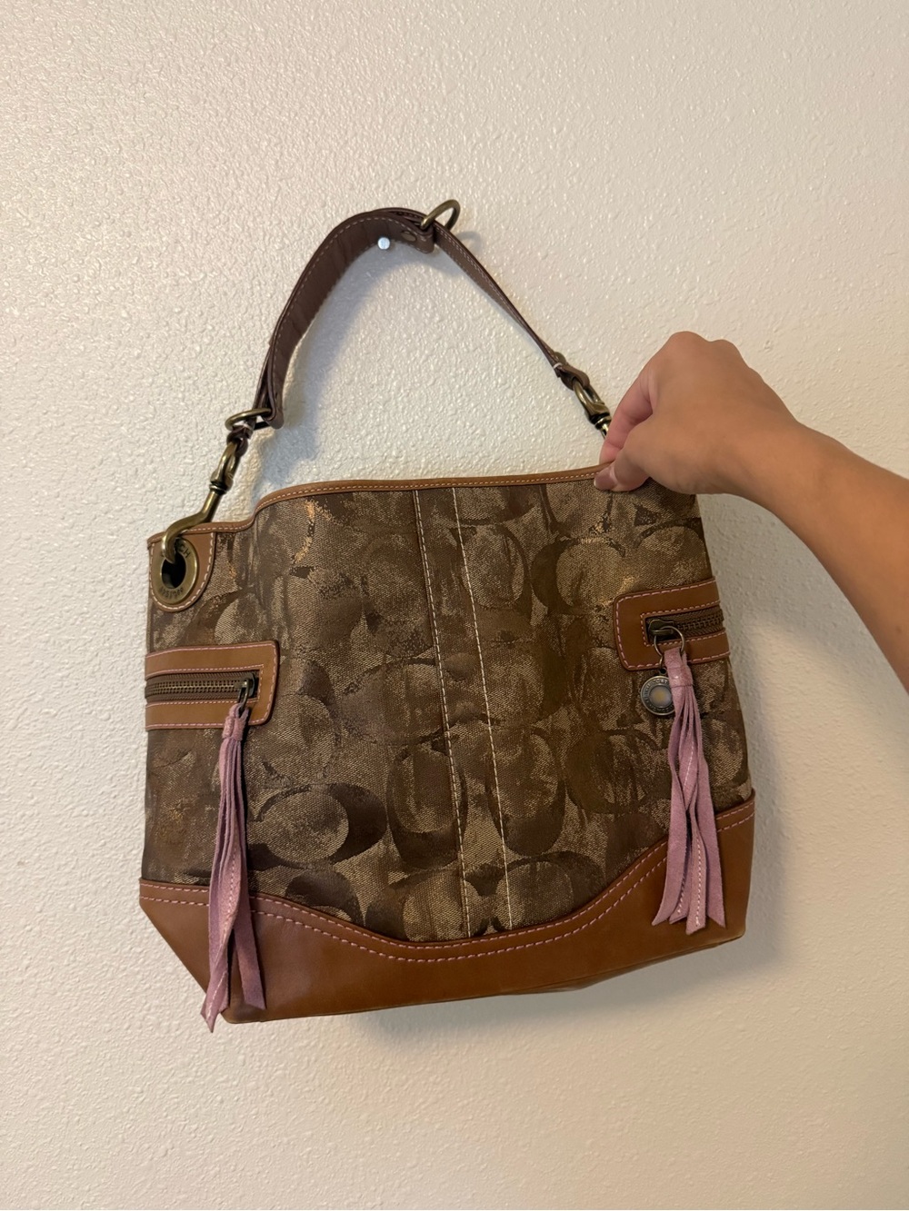 Coach Brown Signature Canvas Shoulder Bag with Pink Tassels